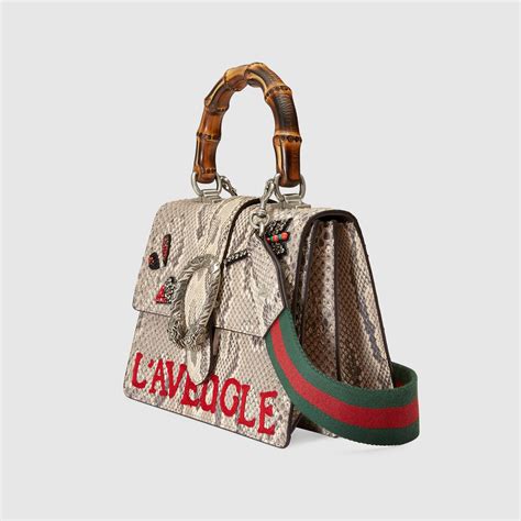 gucci bag with tiger head|Gucci dionysus snake bag.